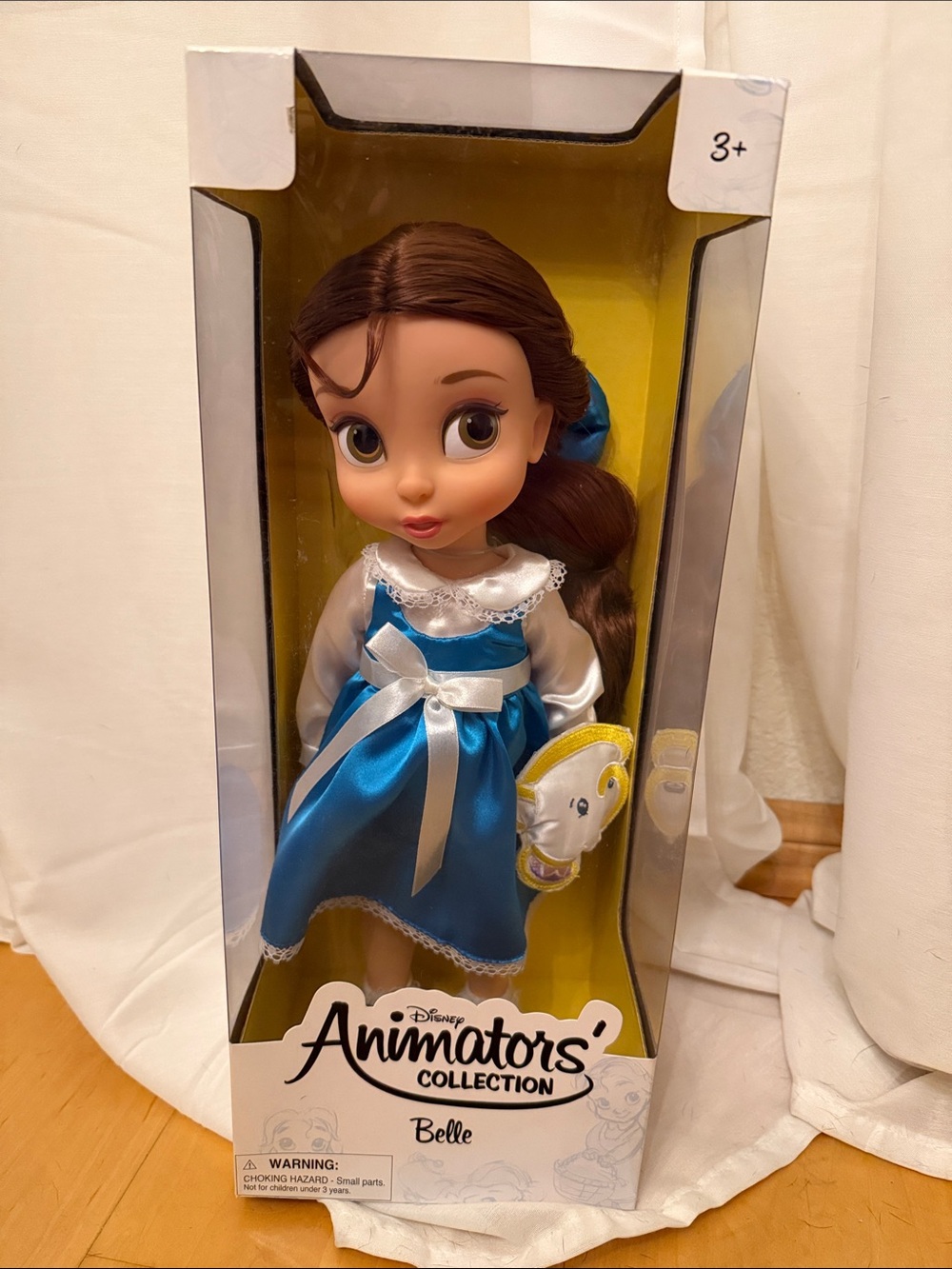 Disney Belle Doll in Blue Dress with Yellow Teacup Accessory